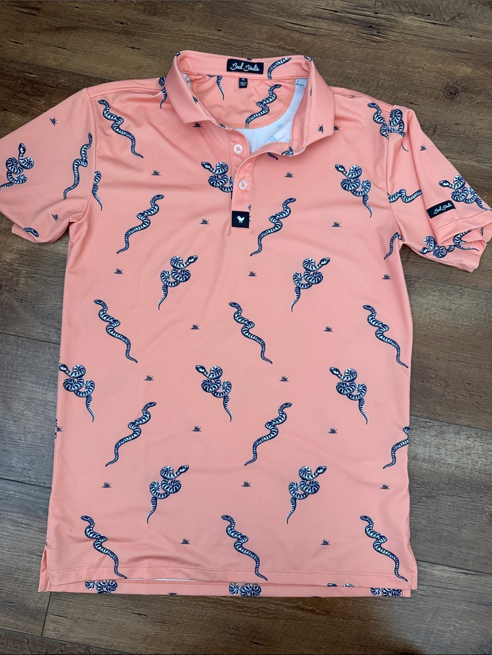 Bad Birdie Peach Polo with Navy Snake Print
